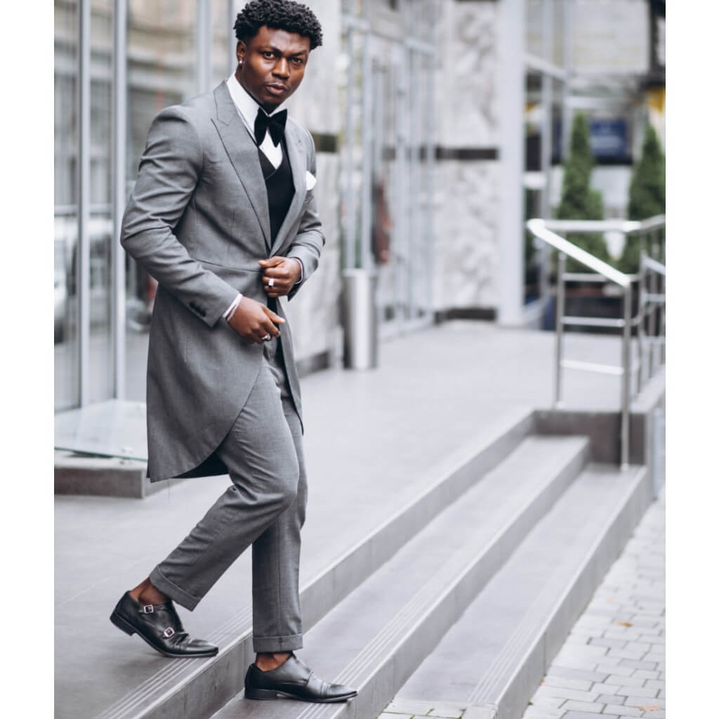 Men in Grey Suits and Black Shoes