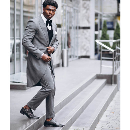 Men in Grey Suits and Black Shoes