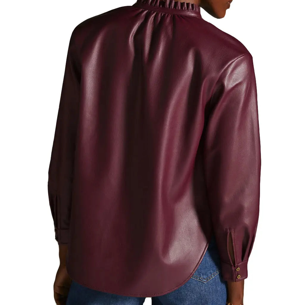 Back Of Young Women Model wearing Ruffled Neckline Vegan Leather Everyday Blouse With curve hem